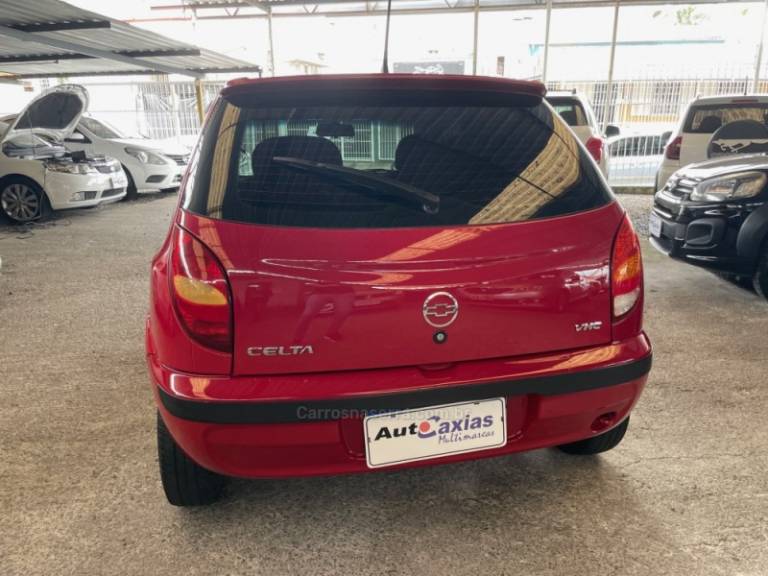 CHEVROLET - CELTA - 2003/2004 - Vermelha - R$ 19.500,00