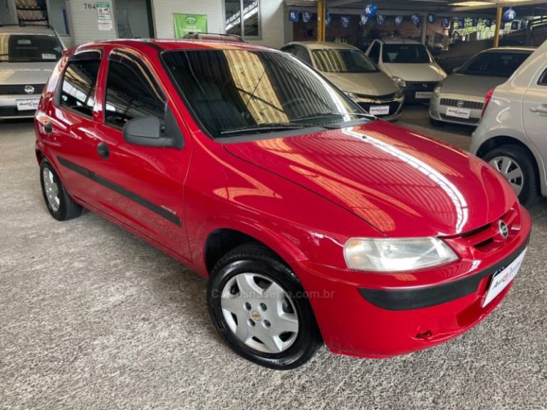 CHEVROLET - CELTA - 2003/2004 - Vermelha - R$ 19.500,00