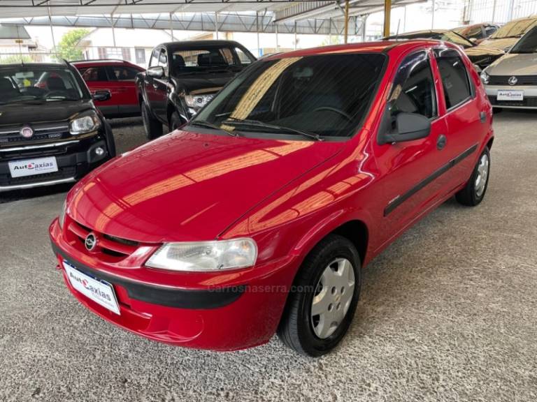 CHEVROLET - CELTA - 2003/2004 - Vermelha - R$ 19.500,00